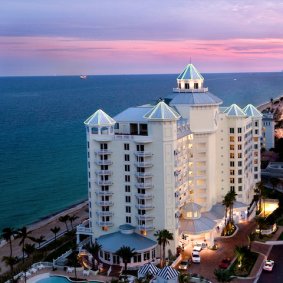 Pelican Grand Beach Resort logo